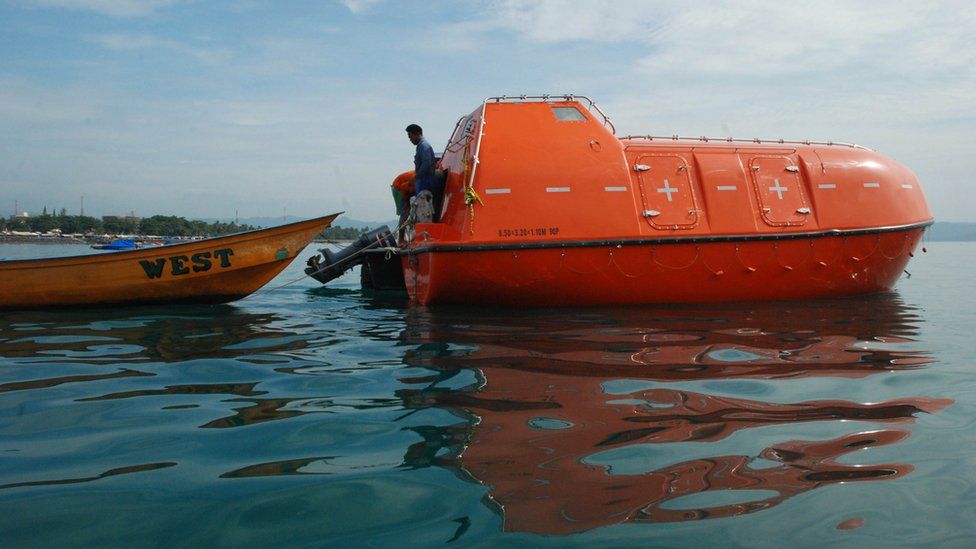 File photo: An empty Australian lifeboat that carried asylum seekers turned back by Australian navy is docked at Pangandaran wharf in western Java island, 8 February 2014