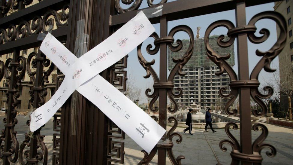 A seal is placed on the gates of a property as the government banned new property sales in counties earmarked as part of a new special economic zone in Xiongxian, Hebei province, China, 3 April 2017.