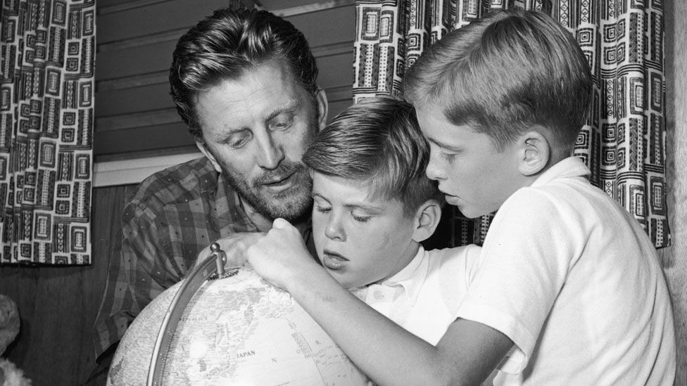 Kirk Douglas with sons Joel and Michael in 1956