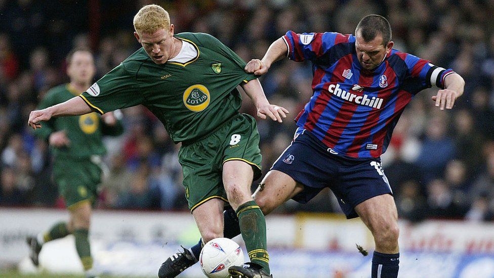 Neil Shipperley of Crystal Palace tries to tackle Gary Holt of Norwich City during the Nationwide Division One