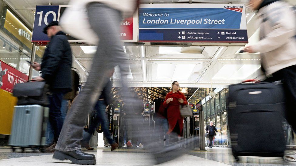 Passengers inside Liverpool Street station