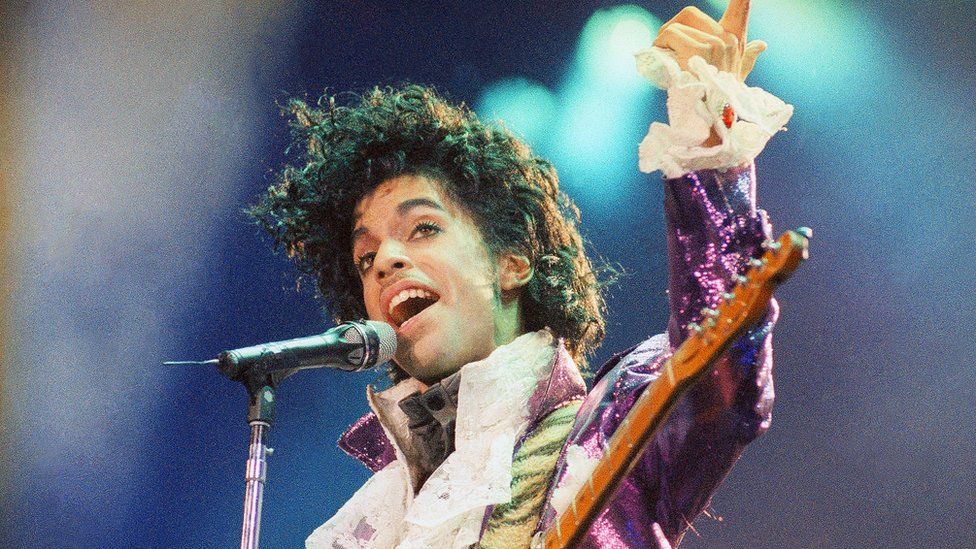 A 1985 file photo shows Prince performing at the Forum in Inglewood, California