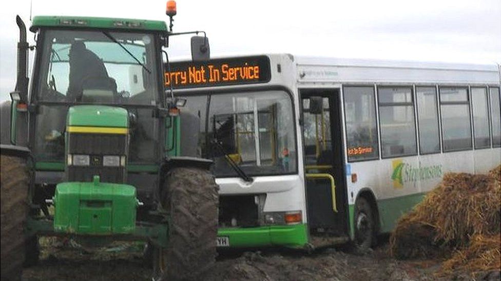 Mr Mizen and his brother Chris used their tractor to tow the bus free