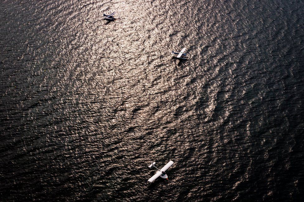 Seaplanes are pictured on Lake Geneva prior to taking off during a meeting of the Swiss Association of Seaplane Pilots (SPAS) in Perroy, Switzerland, 24 June 2017