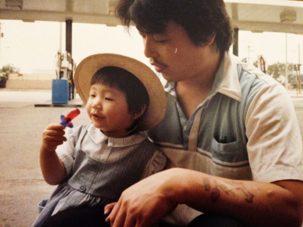 Diana Kim as a child with her father in 1988