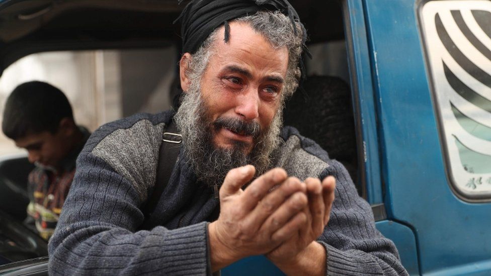 A man sobs as he flees from Maaret al-Numan in the Syrian province of Idlib