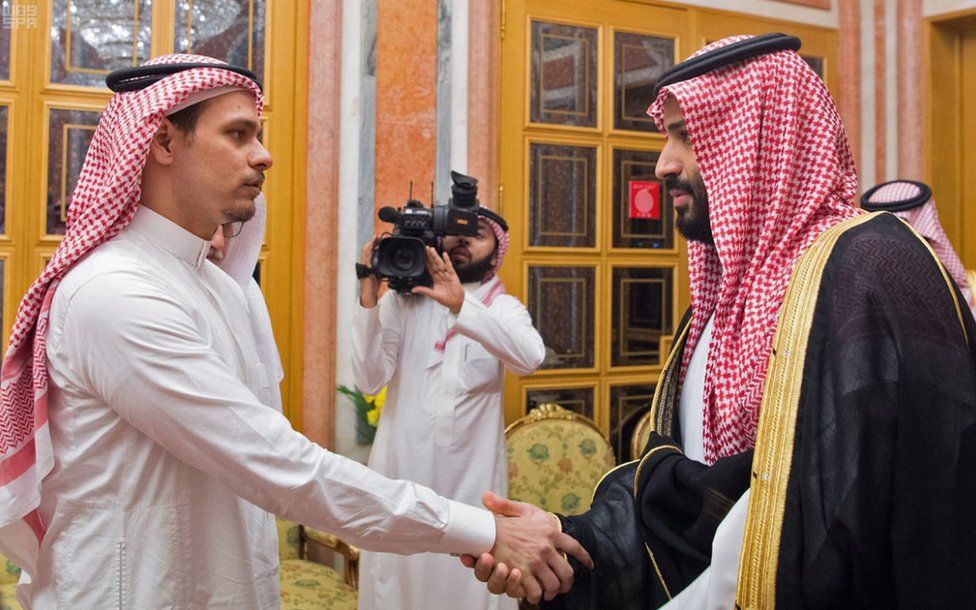 Salah Khashoggi shakes the hand of Saudi Crown Prince Mohammed bin Salman
