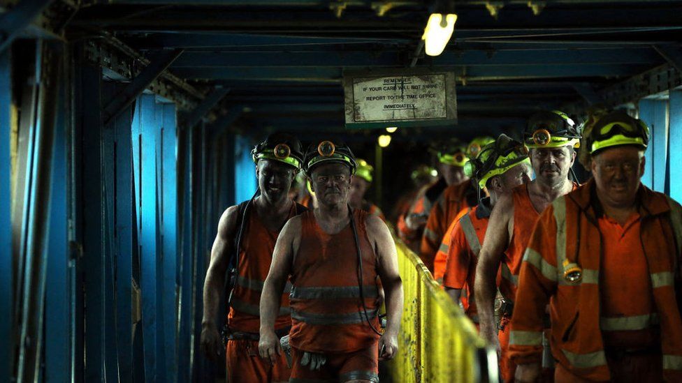 Miners leave Kellingley Colliery in North Yorkshire in 2015