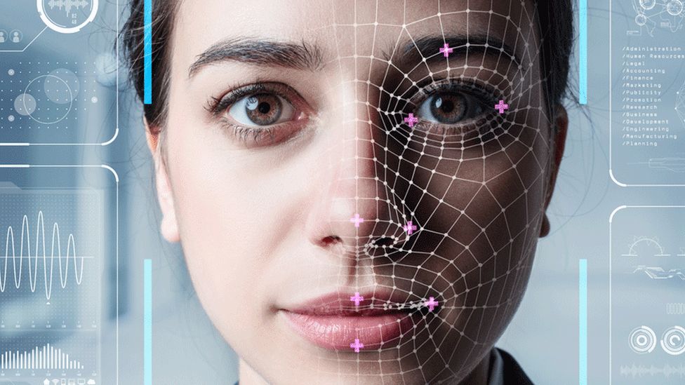 Woman with biometric system on face