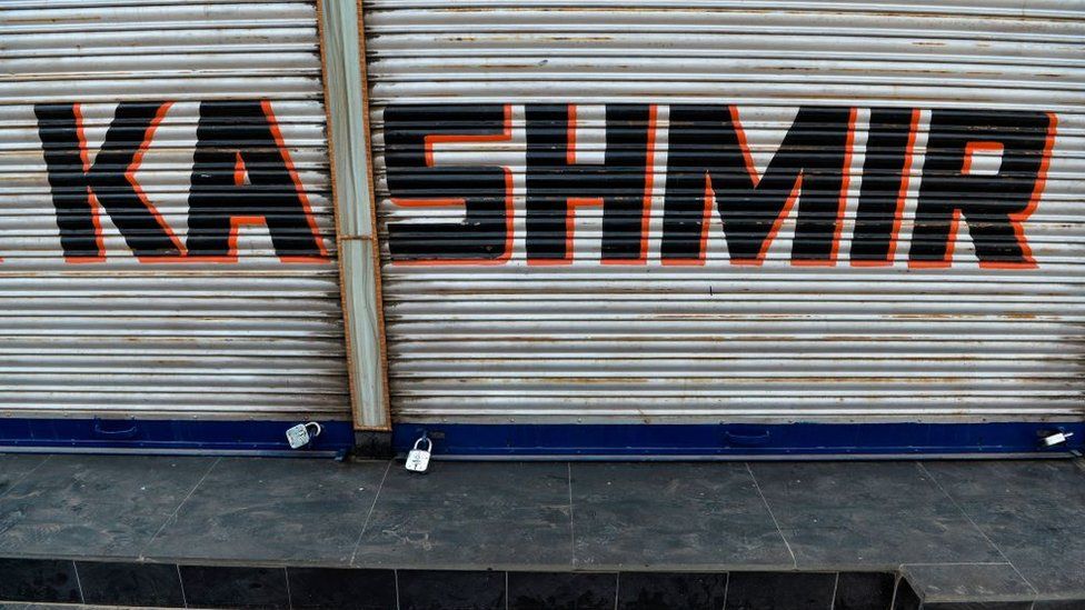 A closed shop is pictured during curfew in Srinagar on August 7, 2019.