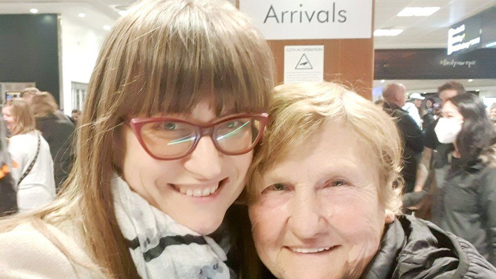 Tanya Mulesa with her grandmother at the airport