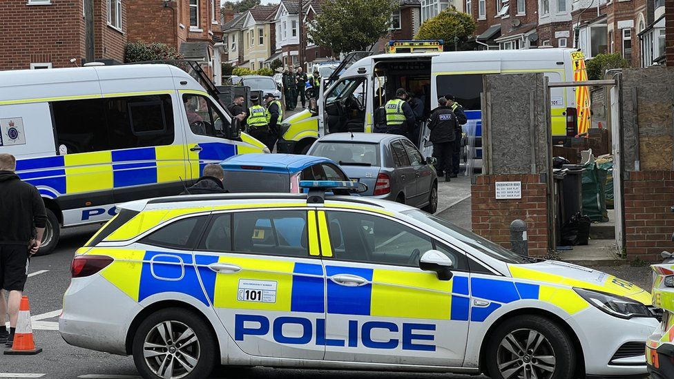 Police cars on Markham Road