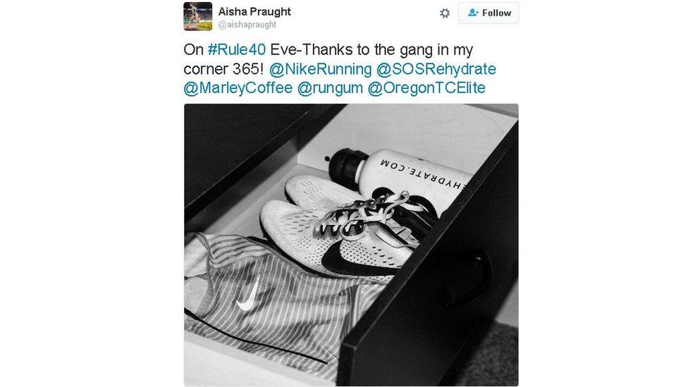 A box of shoes and a water bottle donated to athlete Aisha Praught by her sponsors