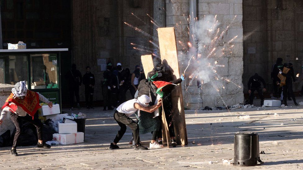 Palestinians clash with Israeli police in the al-Aqsa Mosque compound on 15 April 2022