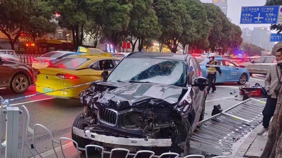 Picture of a badly dented car involved in a car crash in Guangzhou