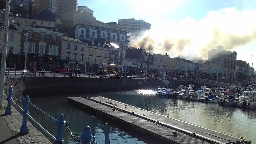 Smoke blowing across Torquay harbour