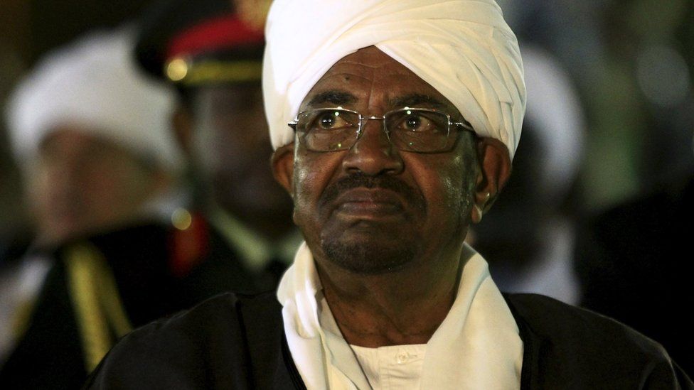 Sudan's President Omar al-Bashir looks on before addressing the nation on the eve of the 60th anniversary of its Independence Day at the presidential palace in Khartoum