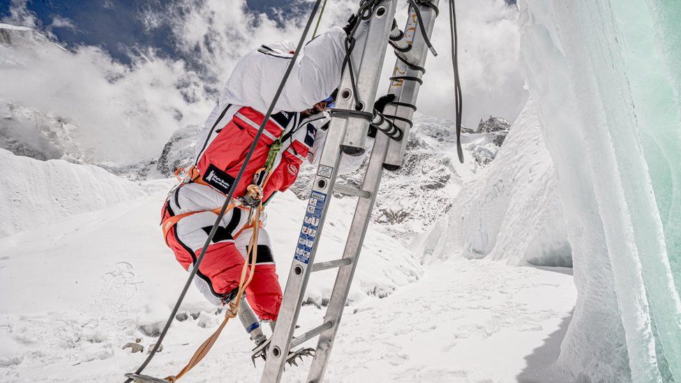 Hari Budha Magar climbing an ice fall