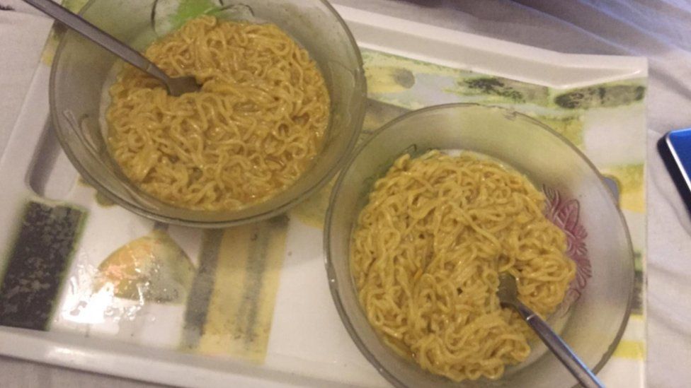 Two bowls of instant noodles