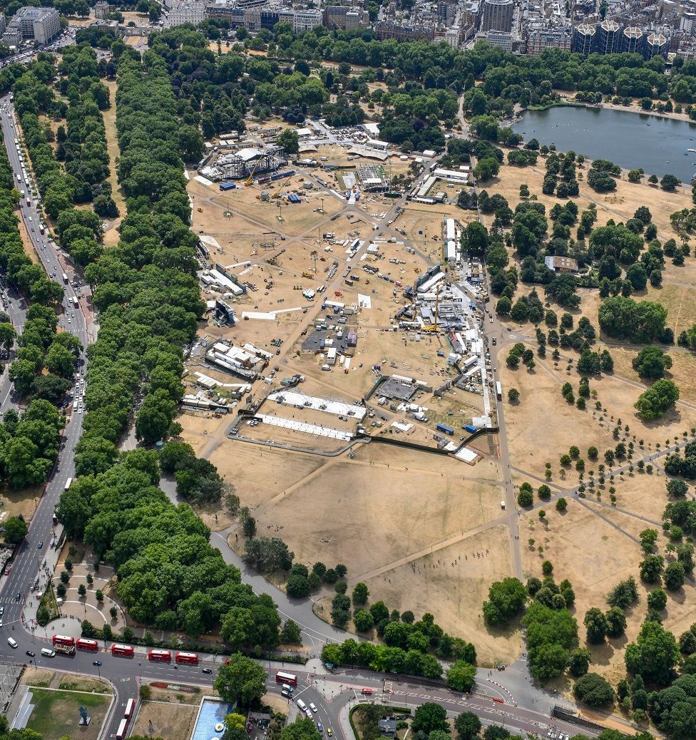 The grass in Hyde Park, London, is seen scorched and yellow