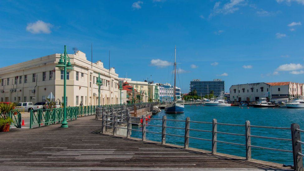 The boardwalk at the marina and the old warehouses at the Careenage Harbor in Bridgetown, the capital city of Barbados
