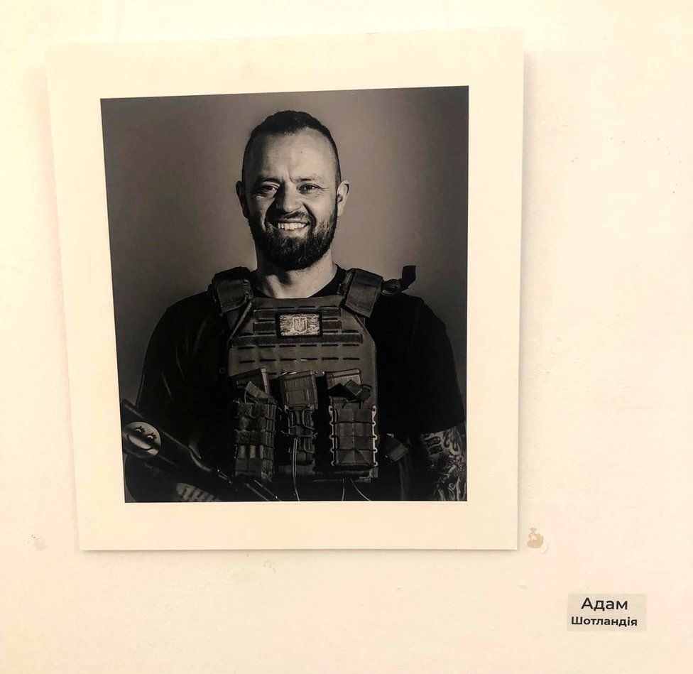 Adam's portrait hangs in the Sophia Centre in Kyiv as part of the "Warriors of the World - Warriors of Light" exhibition
