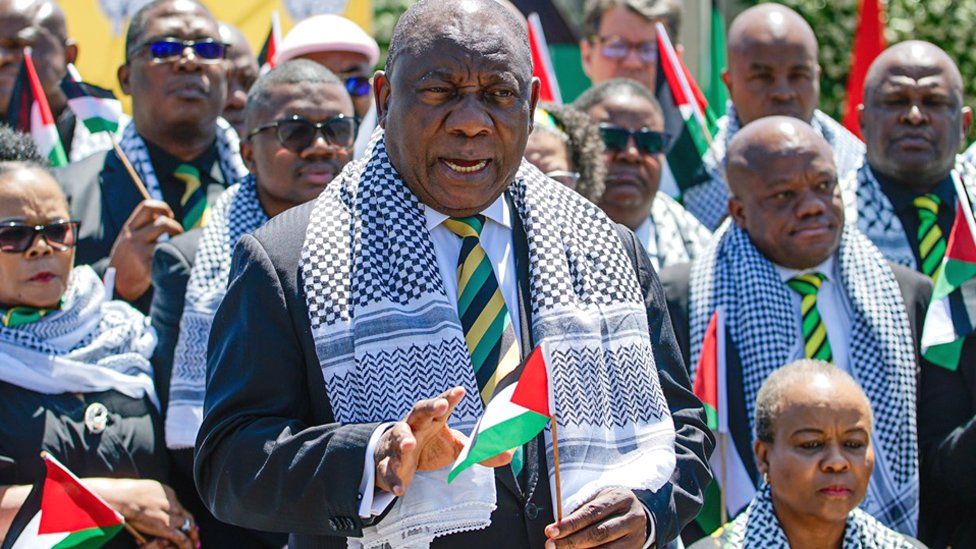 President Cyril Ramaphosa and ANC's NEC members with Palestinian flags and each wearing a keffiyeh - 14 October 2023