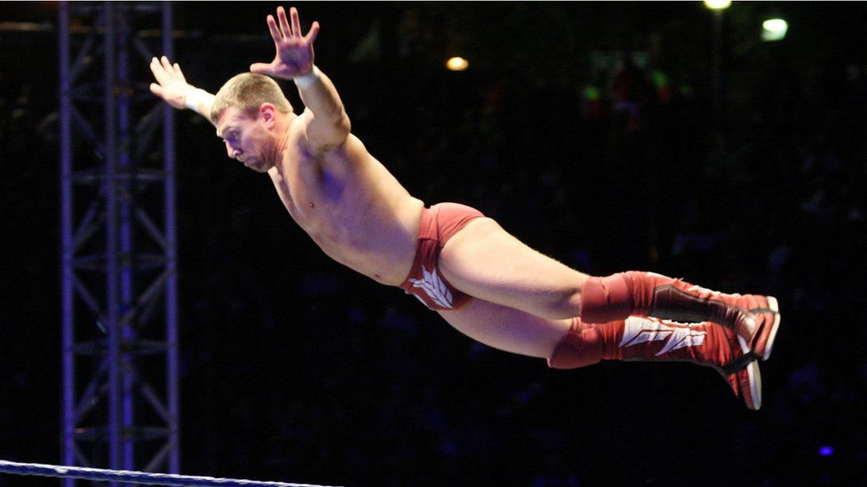 Wrestler in mid-air