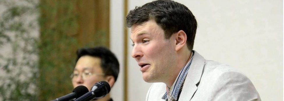 This file photo taken on February 29, 2016 and released by North Korea's official Korean Central News Agency (KCNA) on March 1, 2016 shows US student Otto Frederick Warmbier (R), who was arrested for committing hostile acts against North Korea, speaking at a press conference in Pyongyang.