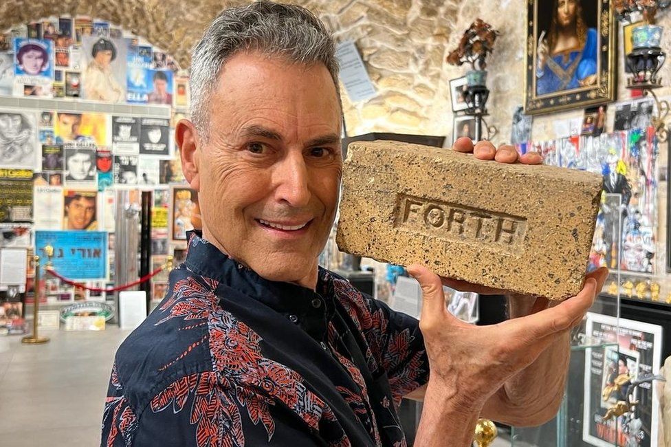 Uri Geller unearths Scottish brick below Israeli museum