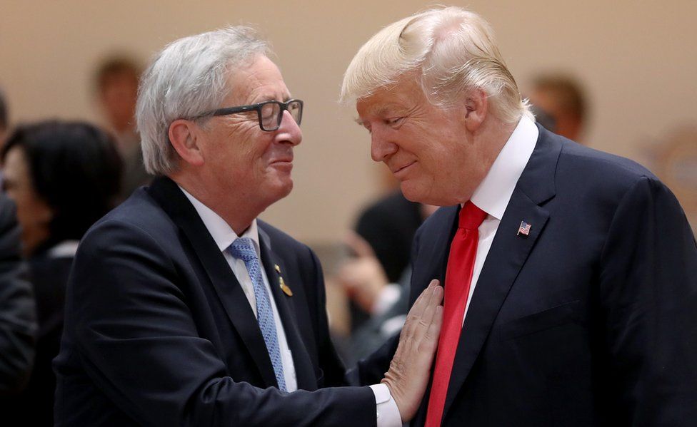 President Donald Trump and President of the European Commission Jean-Claude Juncker chat prior to the morning working session on the second day of the G20 economic summit on July 8, 2017 in Hamburg, Germany