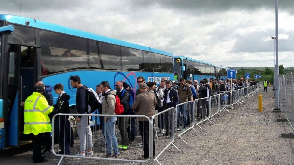 Fans arriving to Cardiff Airport on Saturday were taken by bus into the city centre