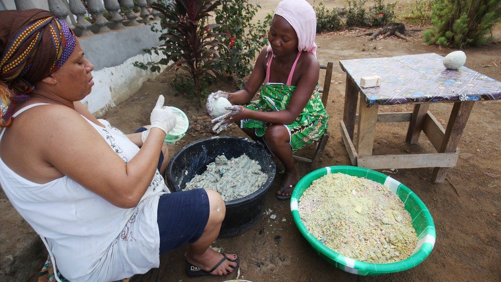 Liberian women making moulding soap, Monrovia, Liberia - Thursday 16 February 2017