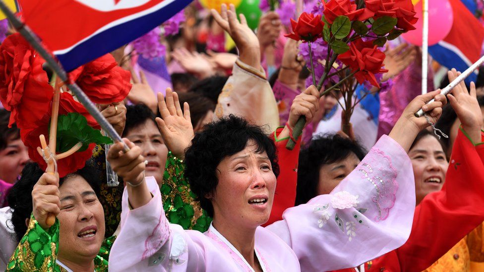 Cheering crowds in North Korea
