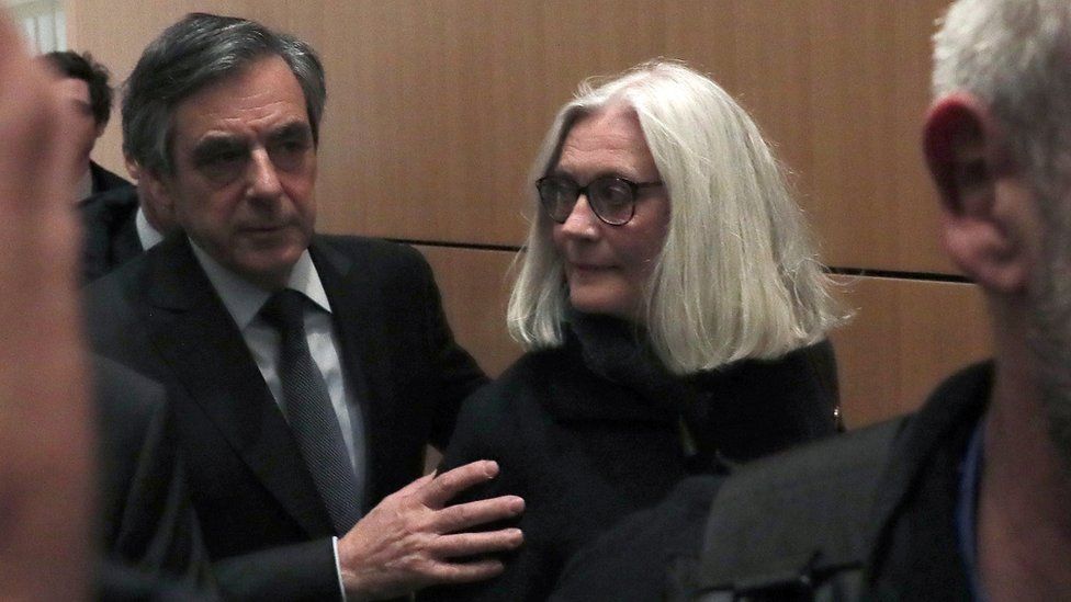François Fillon and Penelope Fillon appear in court in Paris