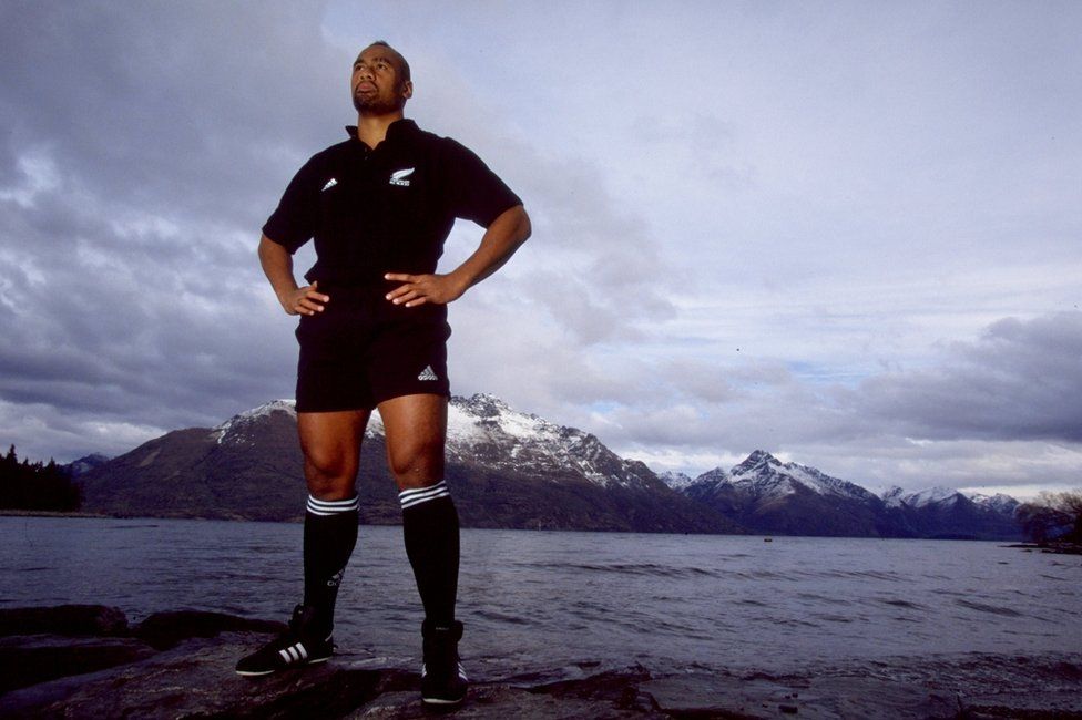 Lomu, posing for a photo outside in Queenstown, New Zealand