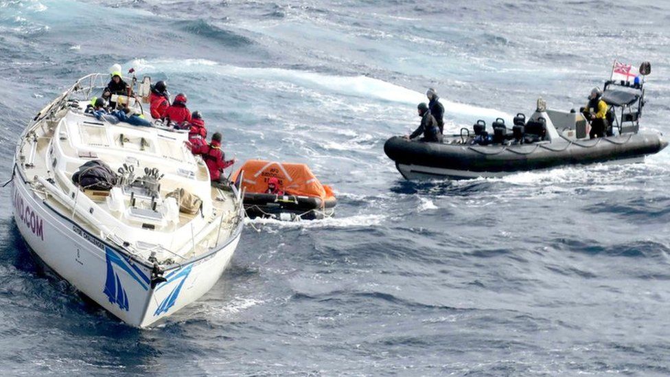 HMS Dragon crew recovering yacht crew