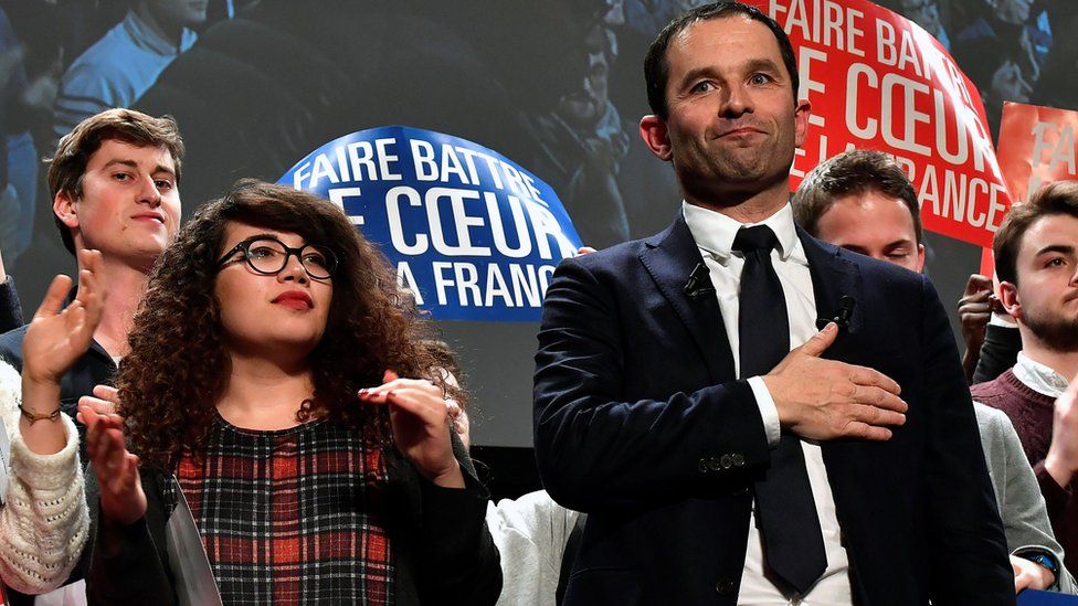 Benoit Hamon (R) and a supporter at a campaign meeting on 17 Jan