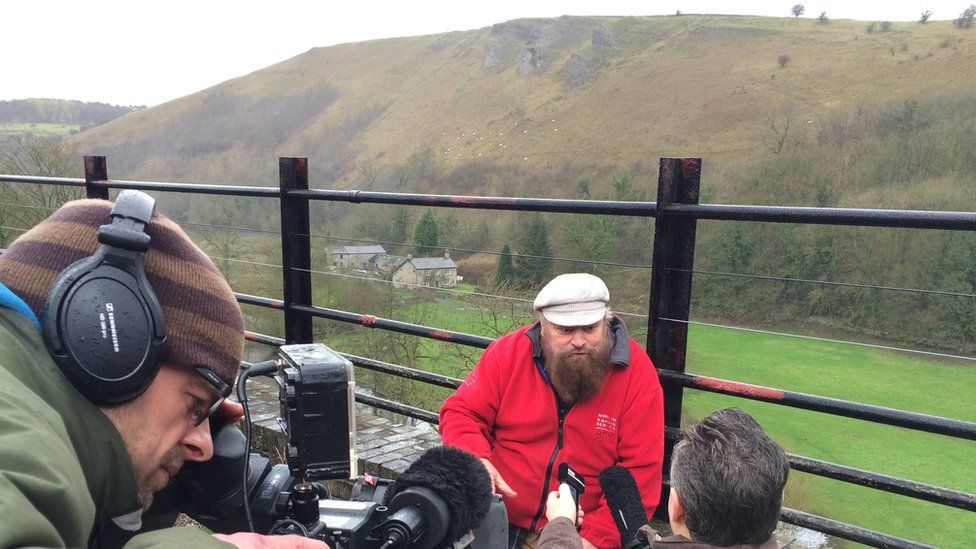 Brian Blessed talks to the media in the Peak District