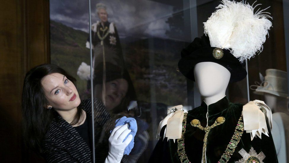 Largest exhibition of the Queen's clothes and accessories ever shown in Scotland will open at the Palace of Holyroodhouse