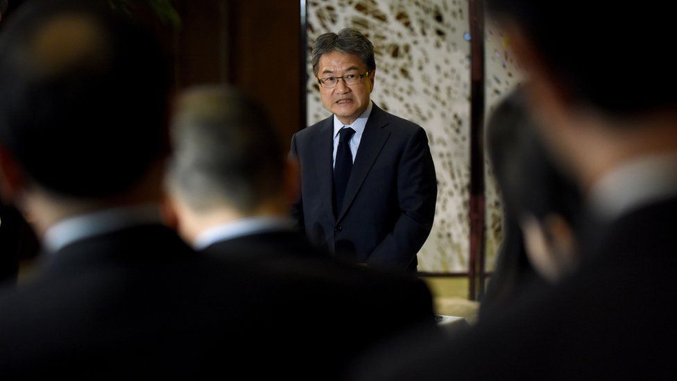 Joseph Yun (C), US special representative for North Korea policy, answers questions from reporters following a meeting with Japanese and South Korean chief nuclear negotiators at the Iikura Guesthouse in Tokyo on 27 April 2017.