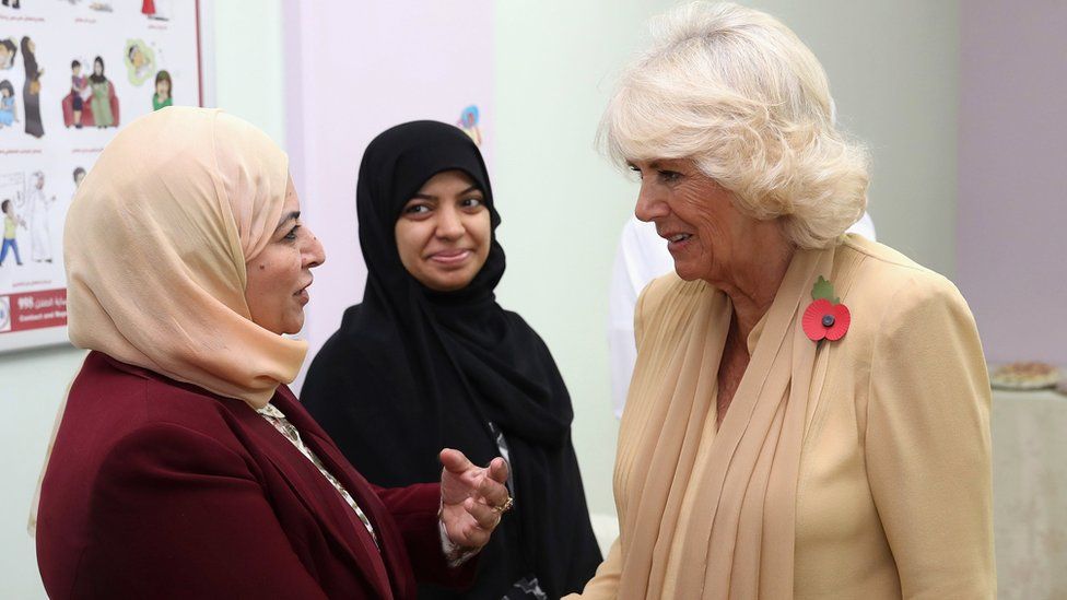 Camilla speaking to staff at the Dar Al Amam Women's Refuge in Bahrain