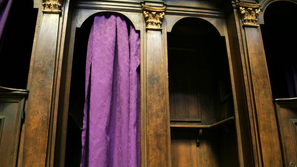 A generic image of a confession booth