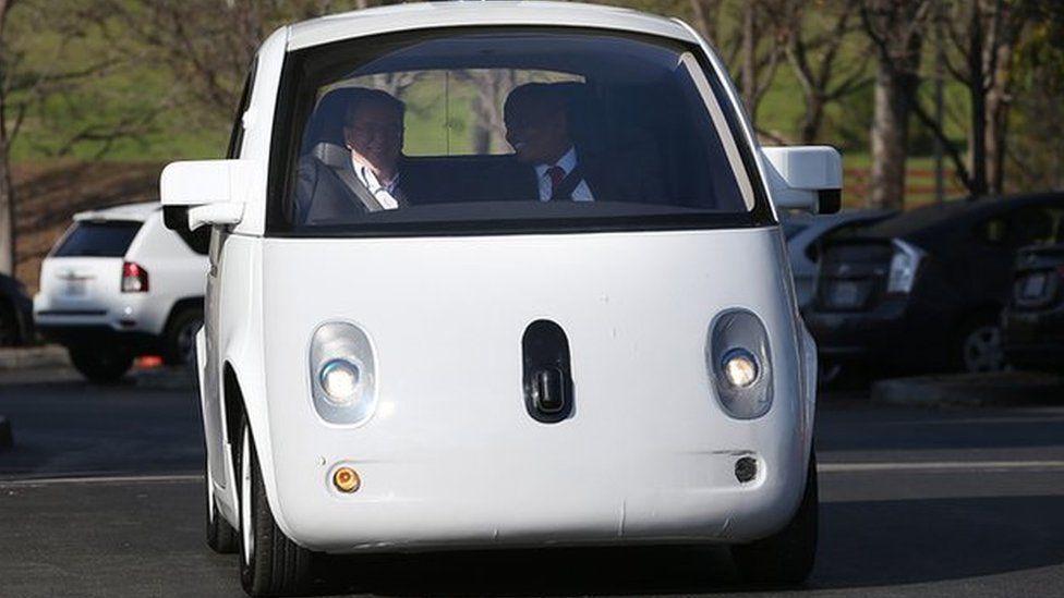 Transportation Secretary Anthony Foxx (R) and Google Chairman Eric Schmidt (L) ride in a Google self-driving car at the Google headquarters on February 2, 2015 in Mountain View, California.
