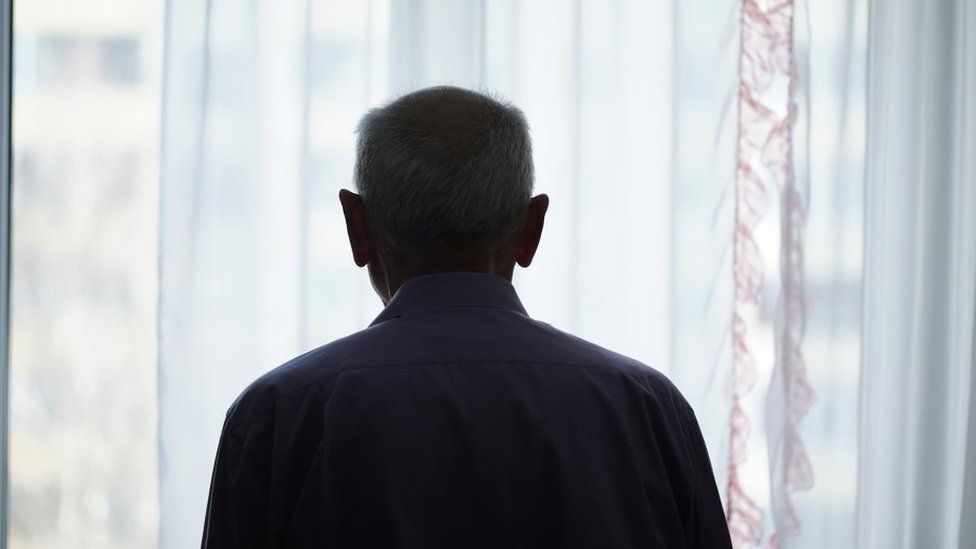 Silhouette of an older person