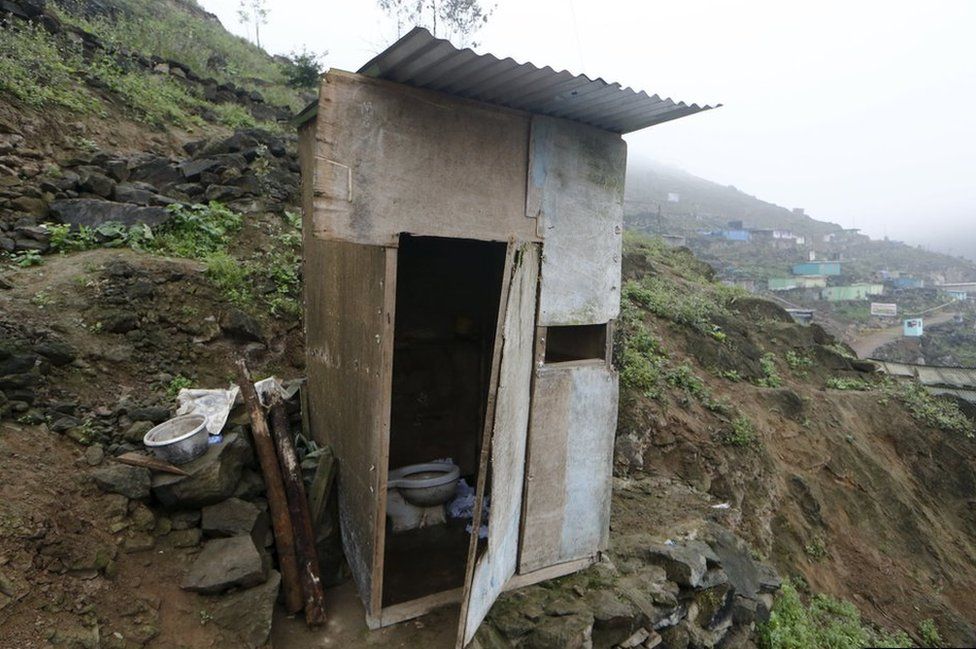 Toilet outside the Llamocca family home at Villa Lourdes in Villa Maria del Triunfo on the outskirts of Lima, Peru.