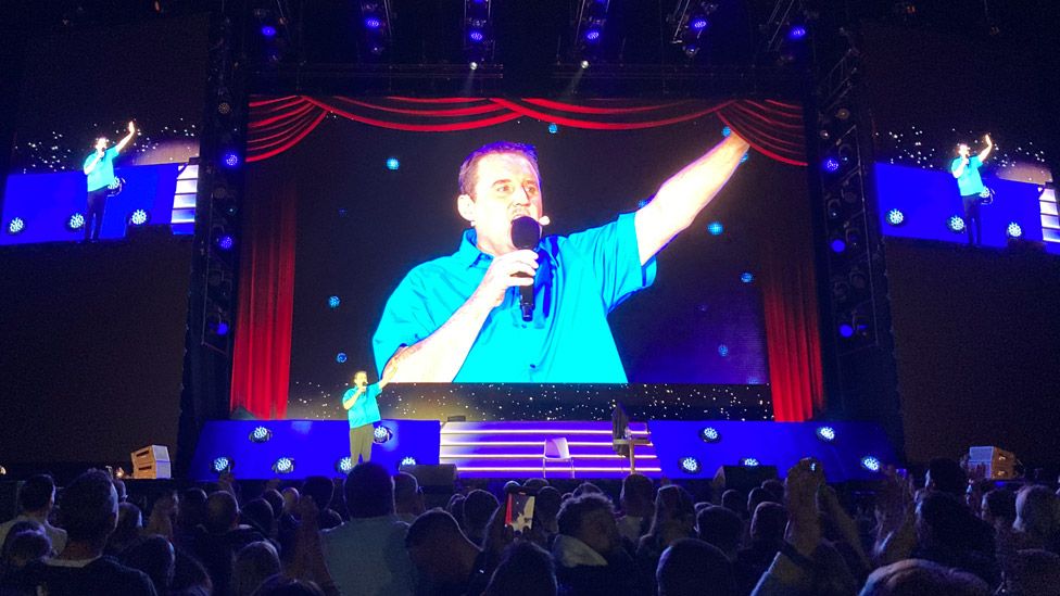 Peter Kay on stage at the Manchester AO Arena