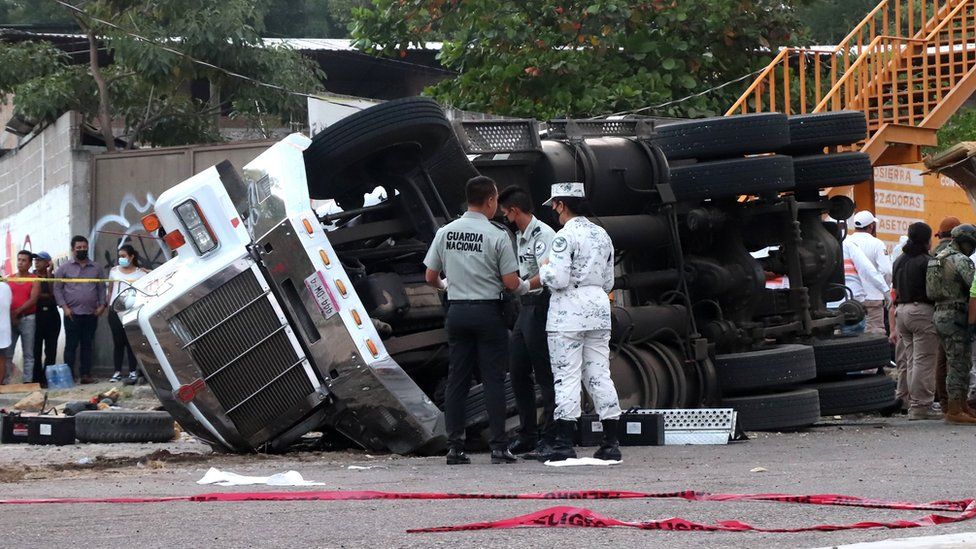 Mexico truck crash At least 54 people killed as trailer overturns image picture