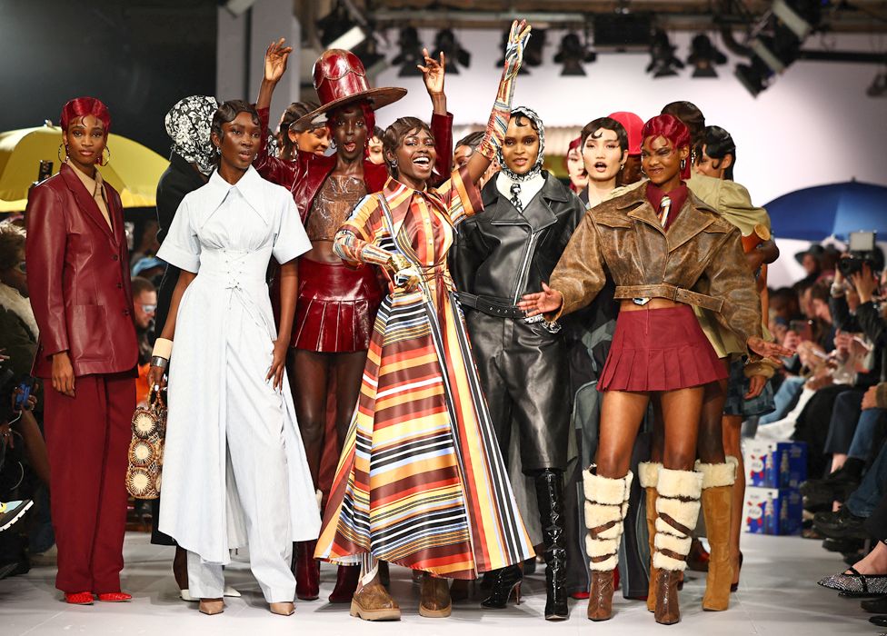 Models present creations by designer Tolu Coker during a catwalk presentation at London Fashion Week in London - February 2024