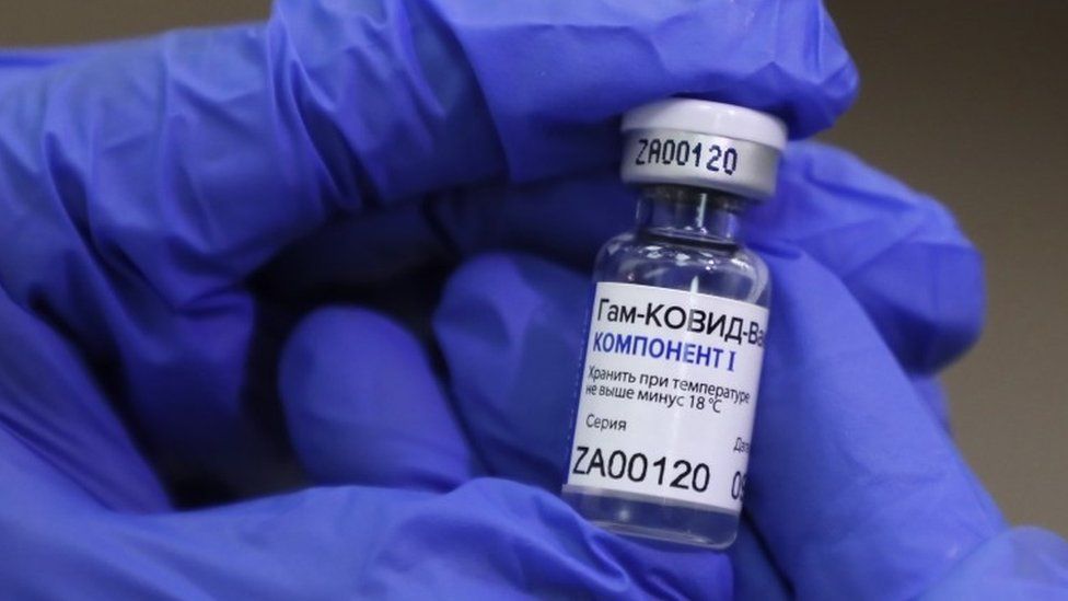 A Russian medic holds Russia's vaccine against Covid-19 at a policlinic in Moscow